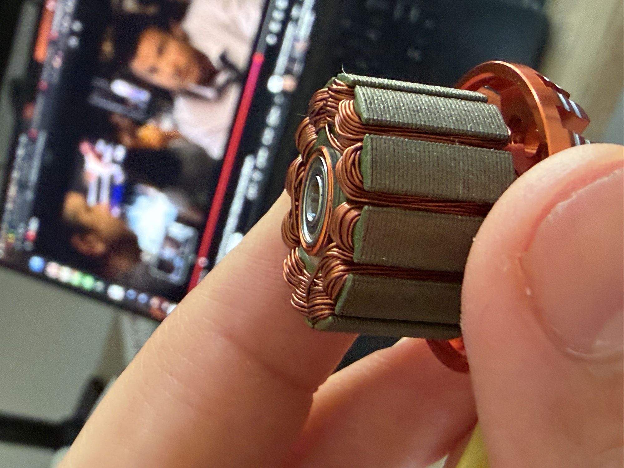Commercial DYS D2830 brushless motor stator exposed during teardown